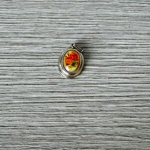 Avon Gold-Tone Oval Floral Pendant in Yellow and Orange